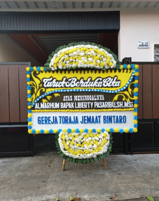 Papan Bunga Duka di Ome